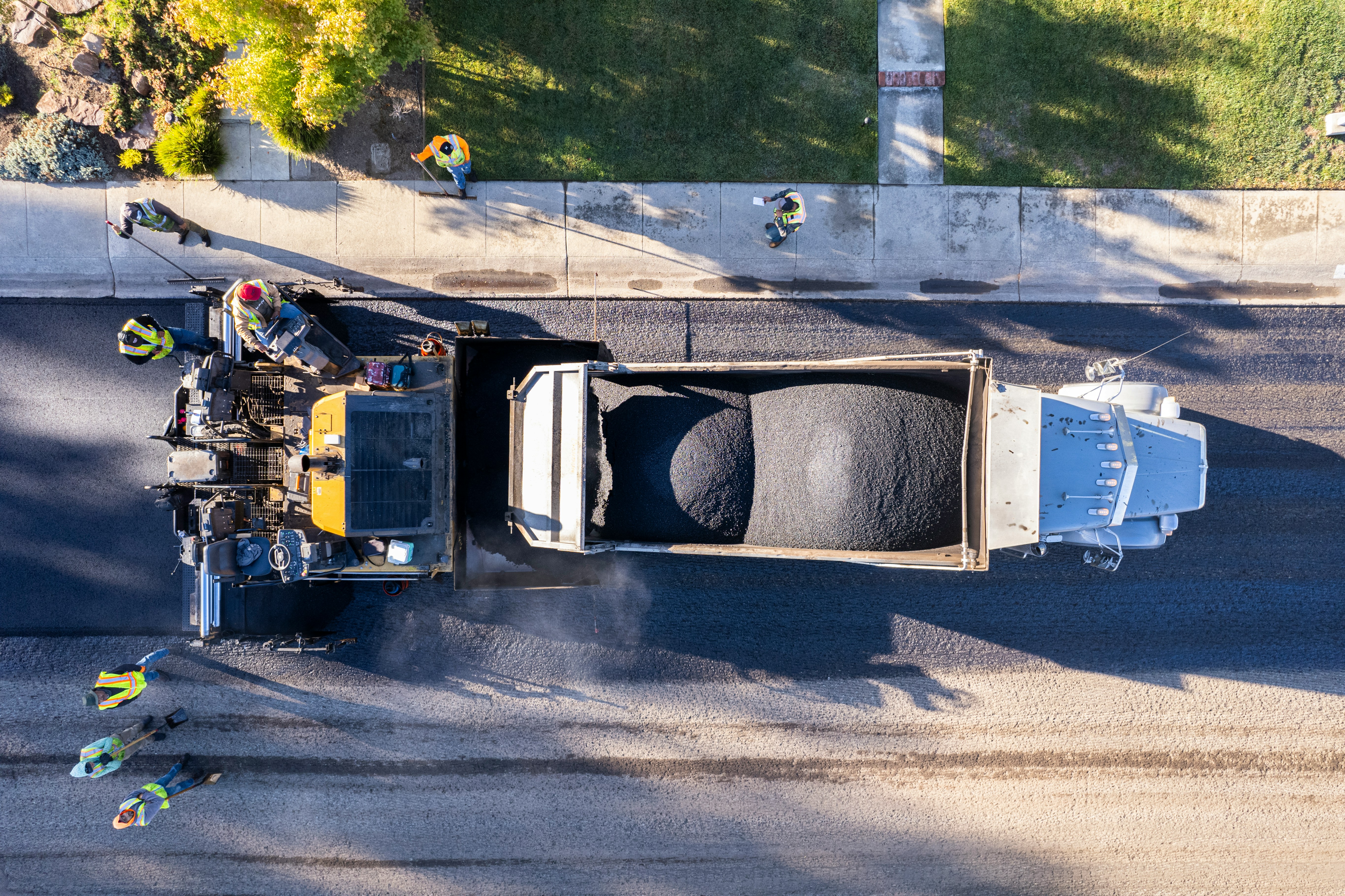 Asphalt milling equipment removing an old pavement surface before overlay